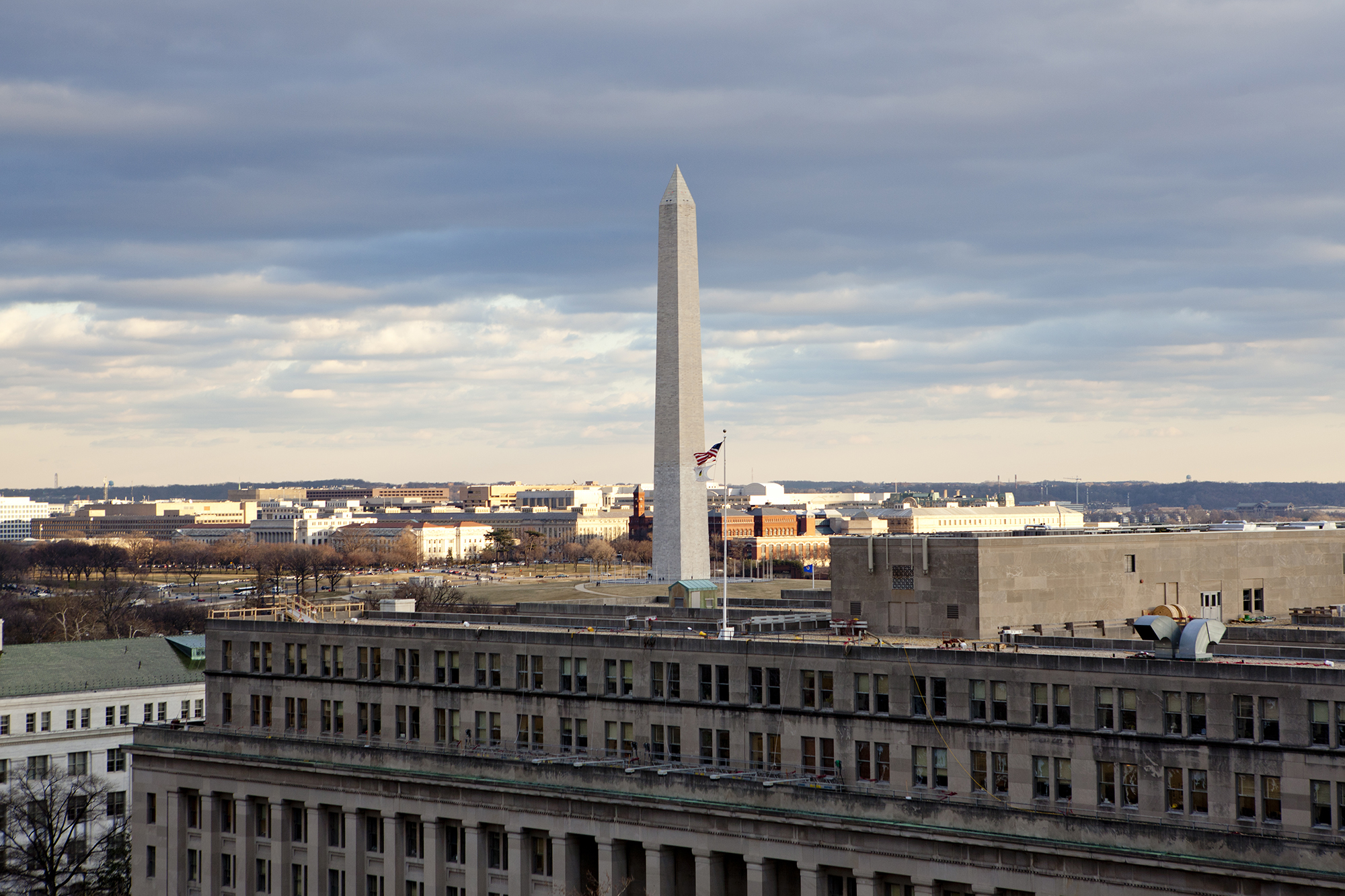 view of buildings in downtown Washington, D.C. with the Washington Monument in the background