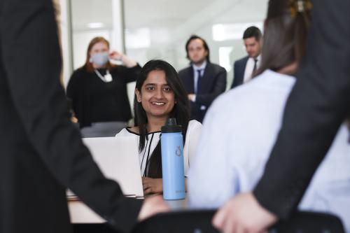 a GWSB MBA student smiles during a classroom project