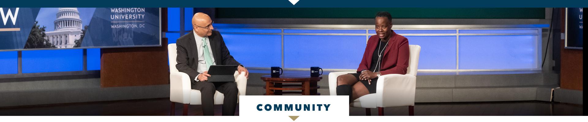Community section header image showing a George Talks Business event with GWSB Dean Anuj Mehrotra chatting with Elena Richards, principal and chief diversity, equity and inclusion officer at KPMG
